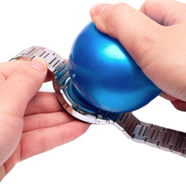 Ball type case back opener