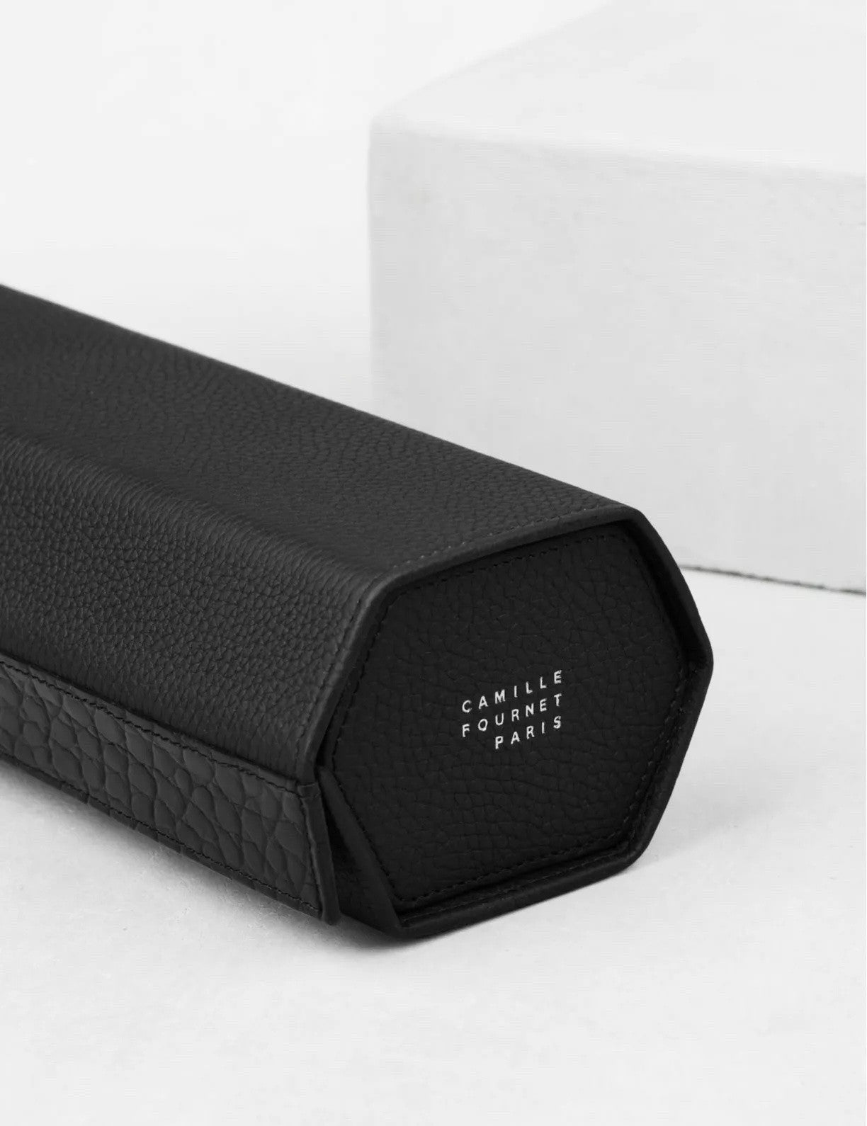 34.33  Triple watch case by Camille Fournet