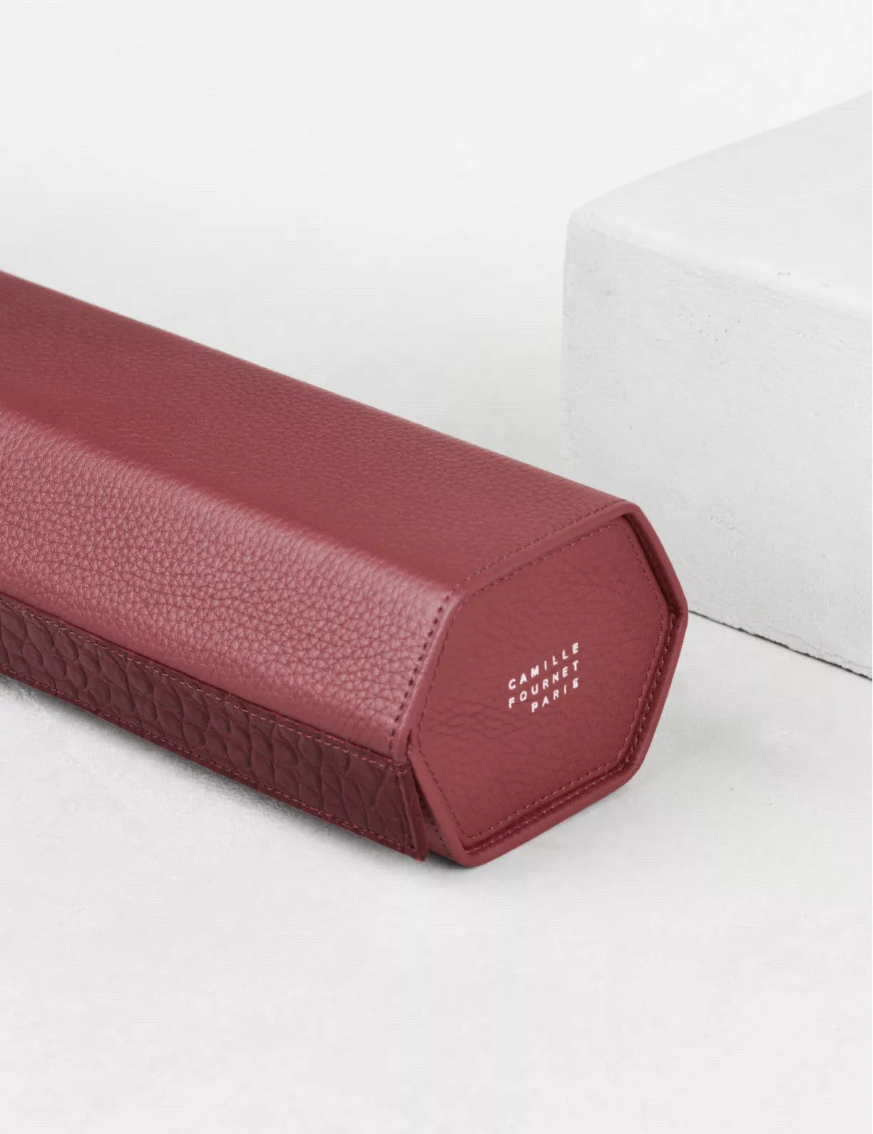 34.33  Triple watch case by Camille Fournet