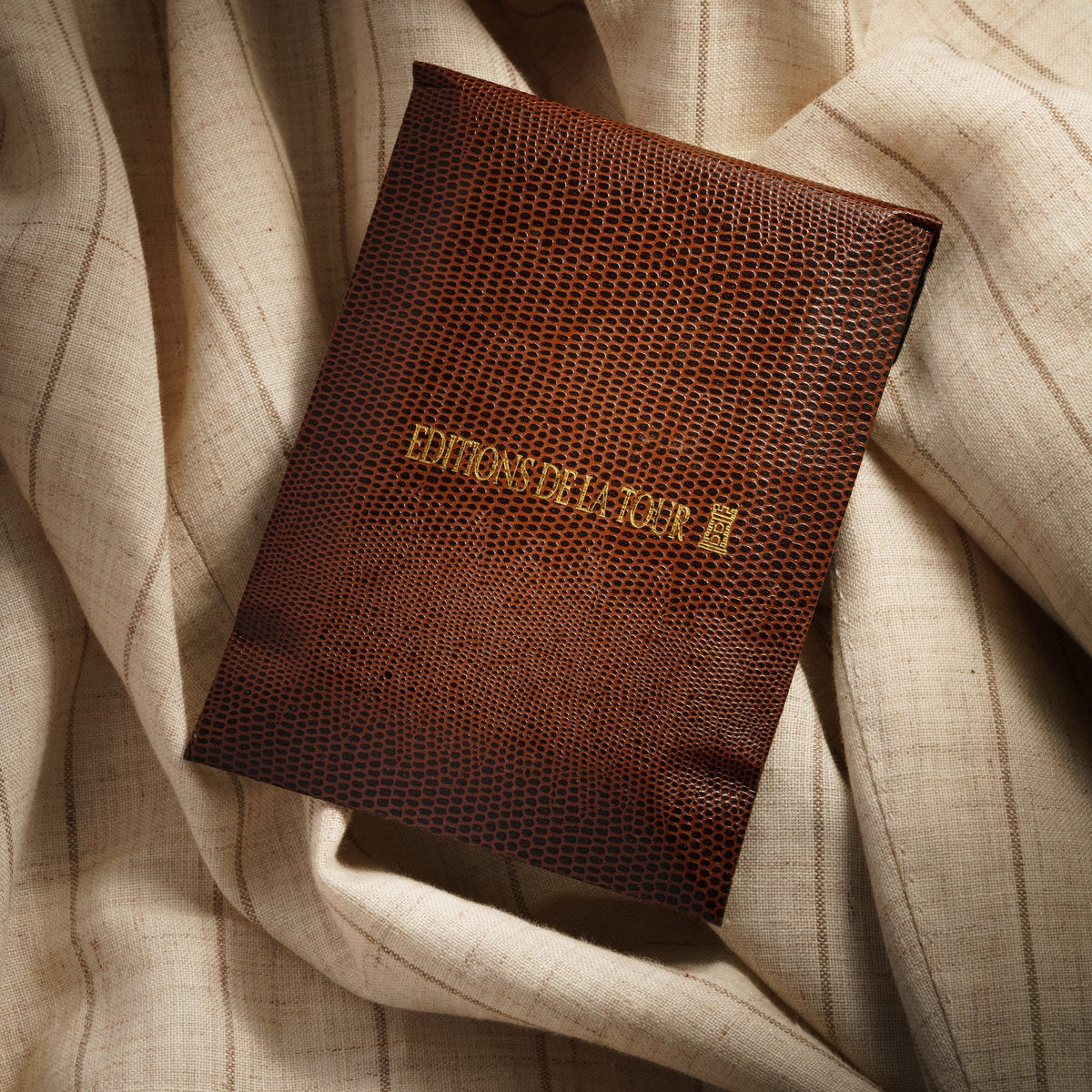 Vintage Watches – reptile-textured paper envelope with gold hot-foil stamping